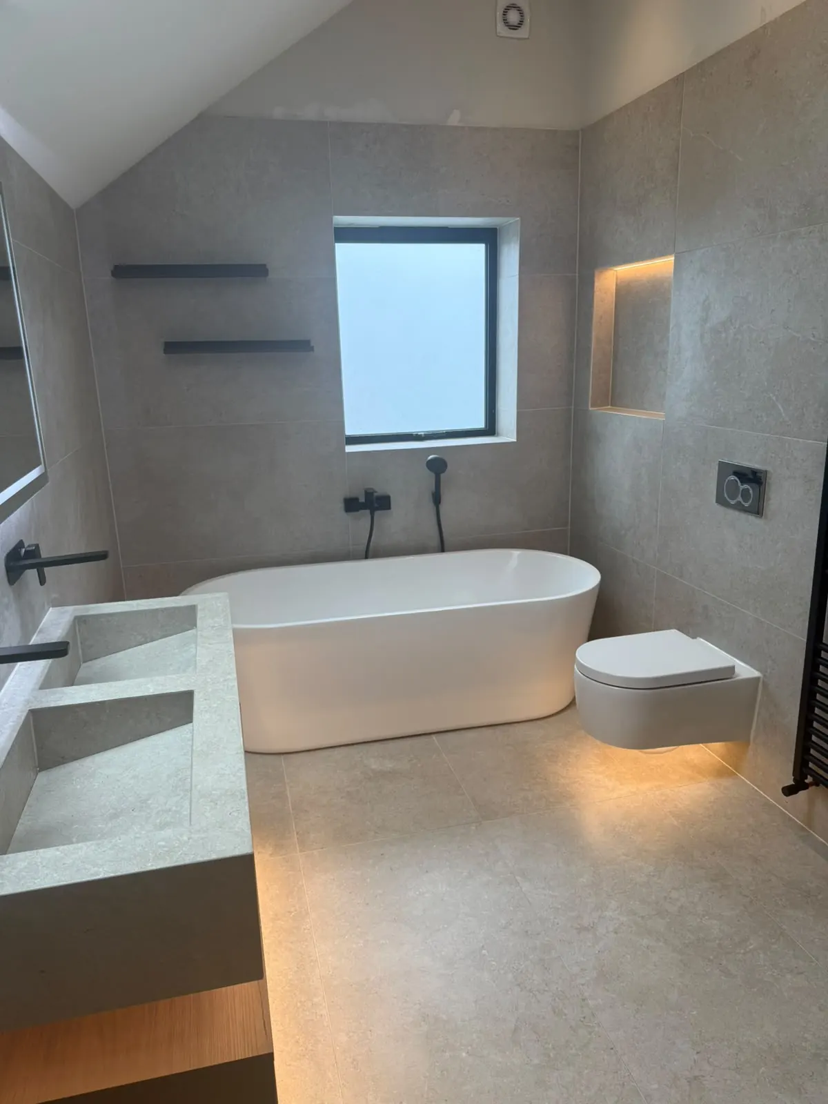 Electrician reviews in Warrington: bathroom with LED niche lighting installed by GN Electrical Services